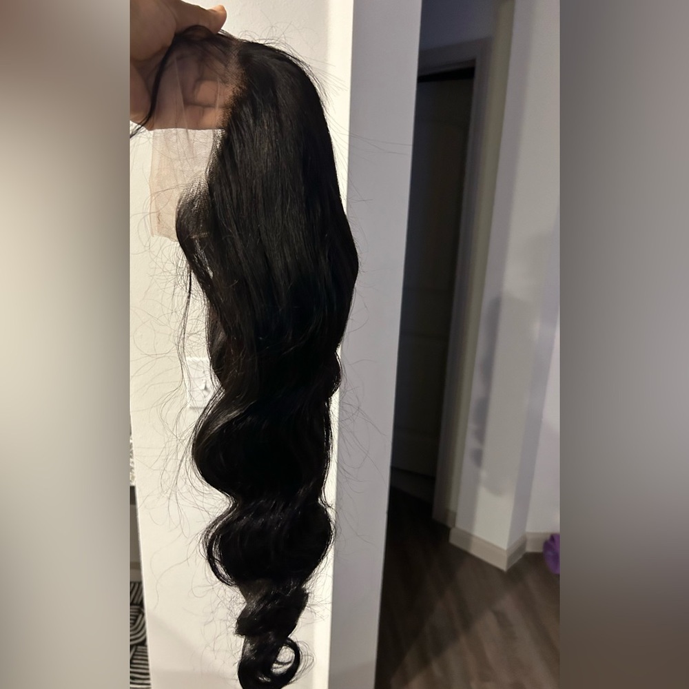 Black virgin human hair 26 inches. Pre plucked HD lace